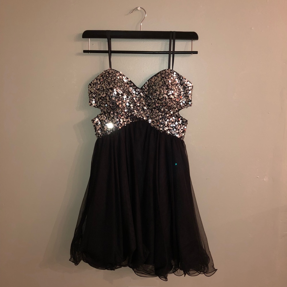 Sparkly black dress with cutouts